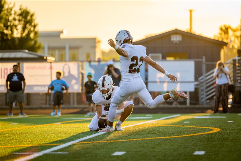 Student-athletes play football